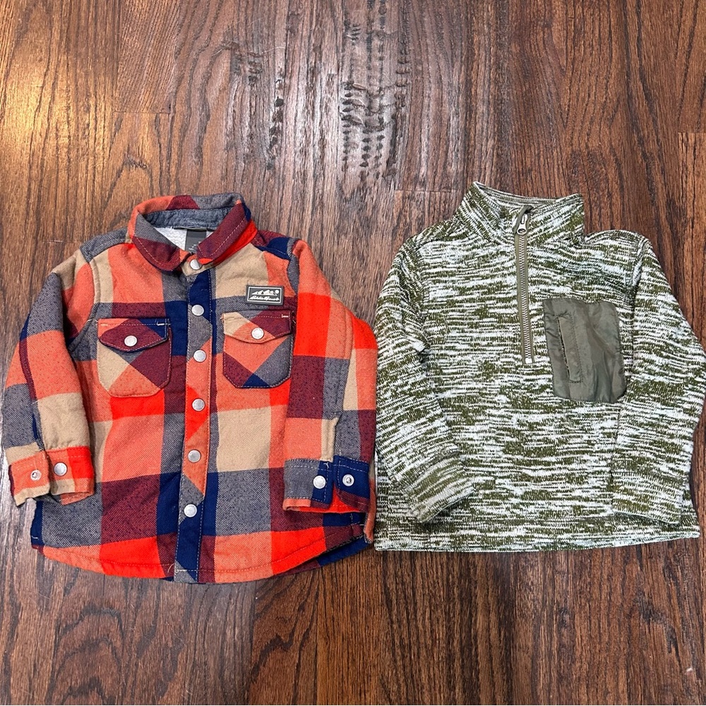 2 Eddie Bauer Boy tops Size 12 months
1-plaid Button Up,1 Pull Over 1/2 Zip